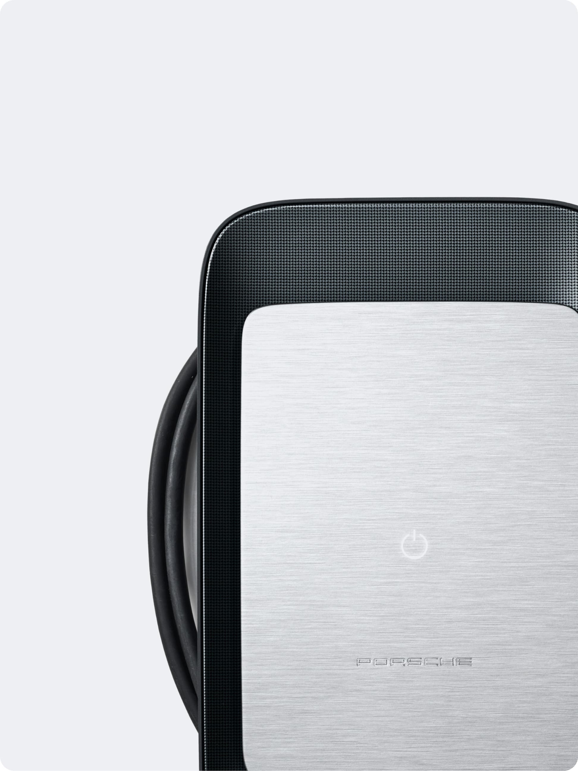 You can see a close up of the Porsche Wallbox on a white background