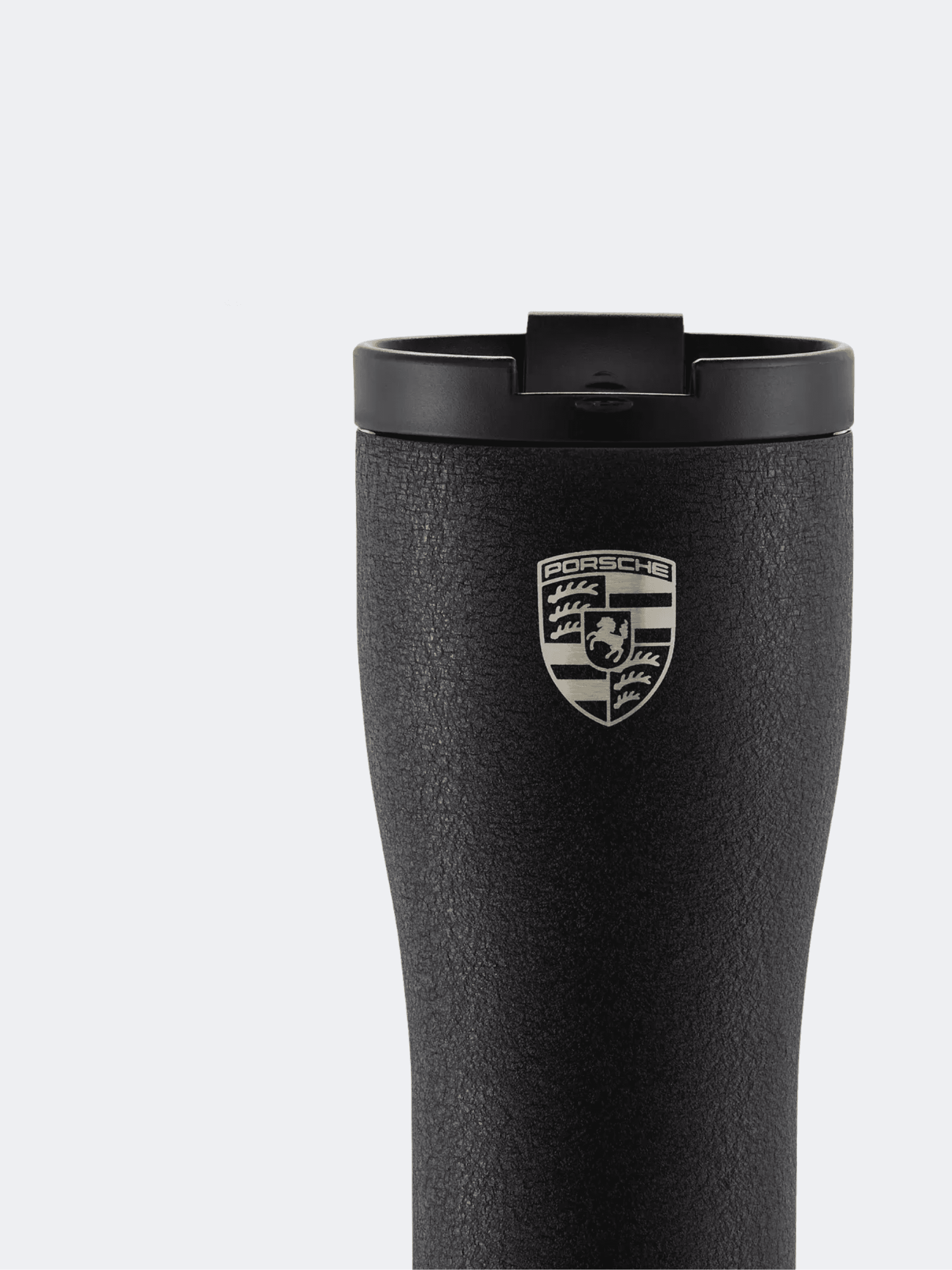 You can see a close up of a Porsche thermo cup in black