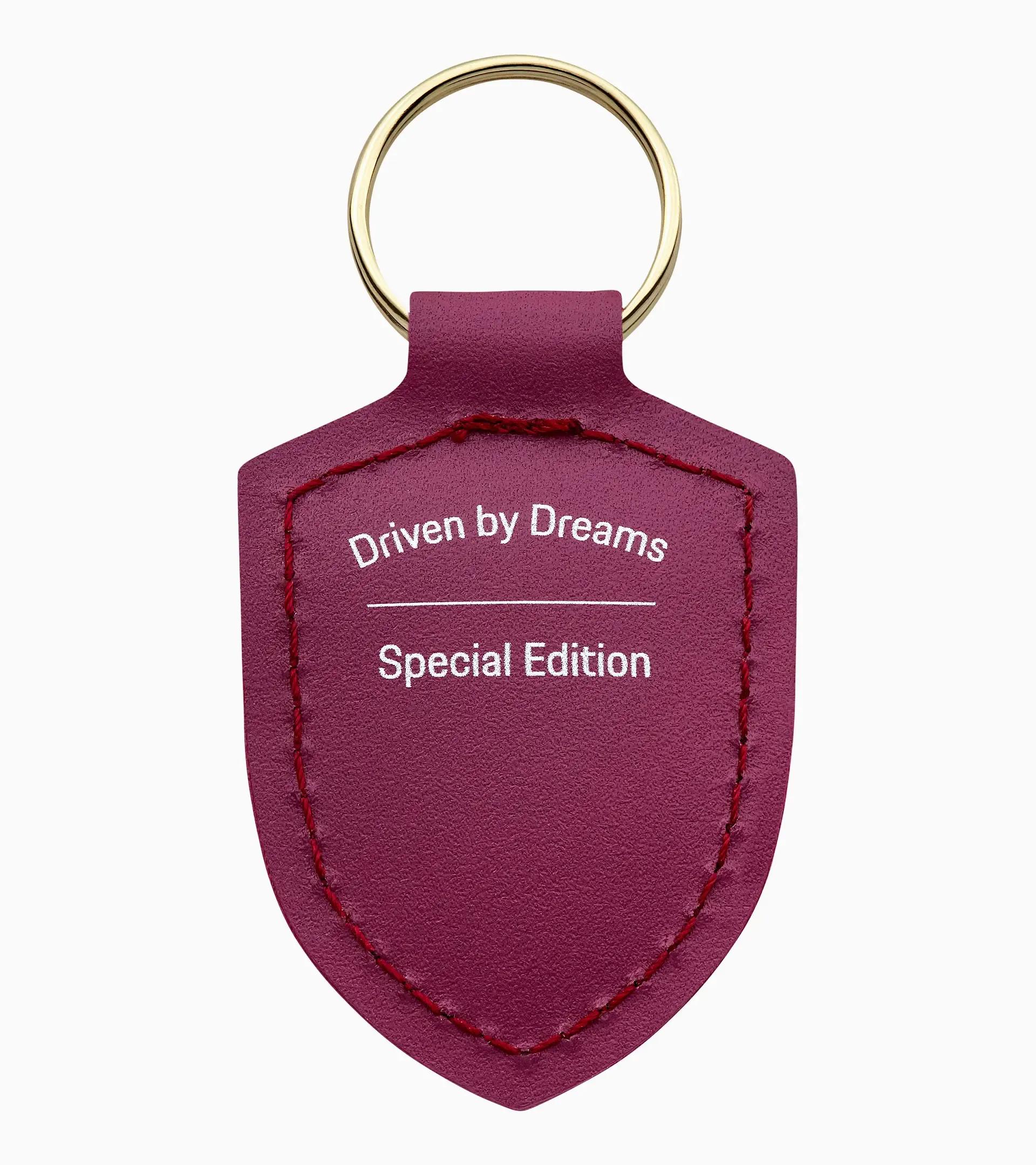 Embleem sleutelhanger "Driven by Dreams" – 75Y thumbnail 1