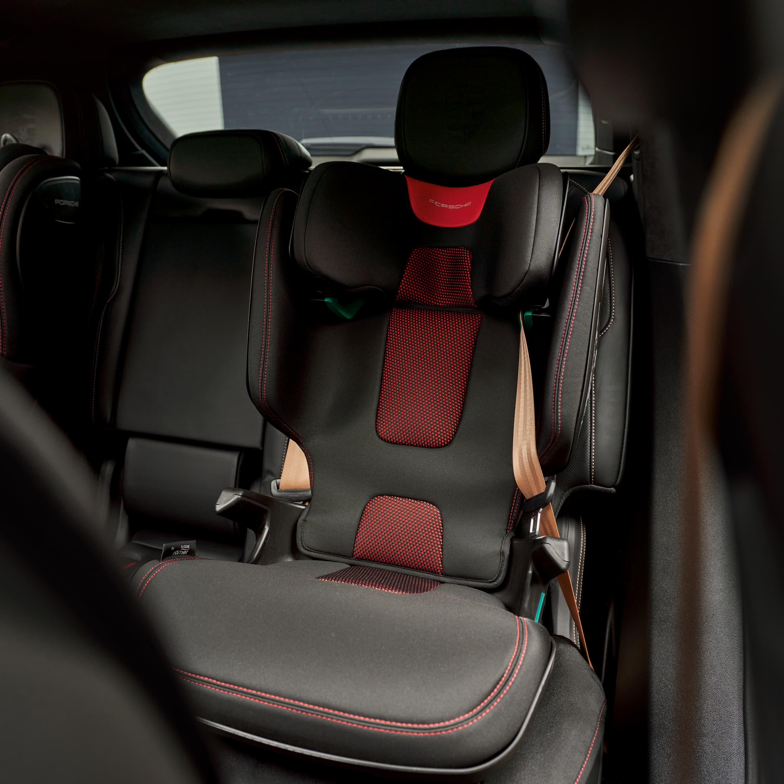 Black and red childseat in a car