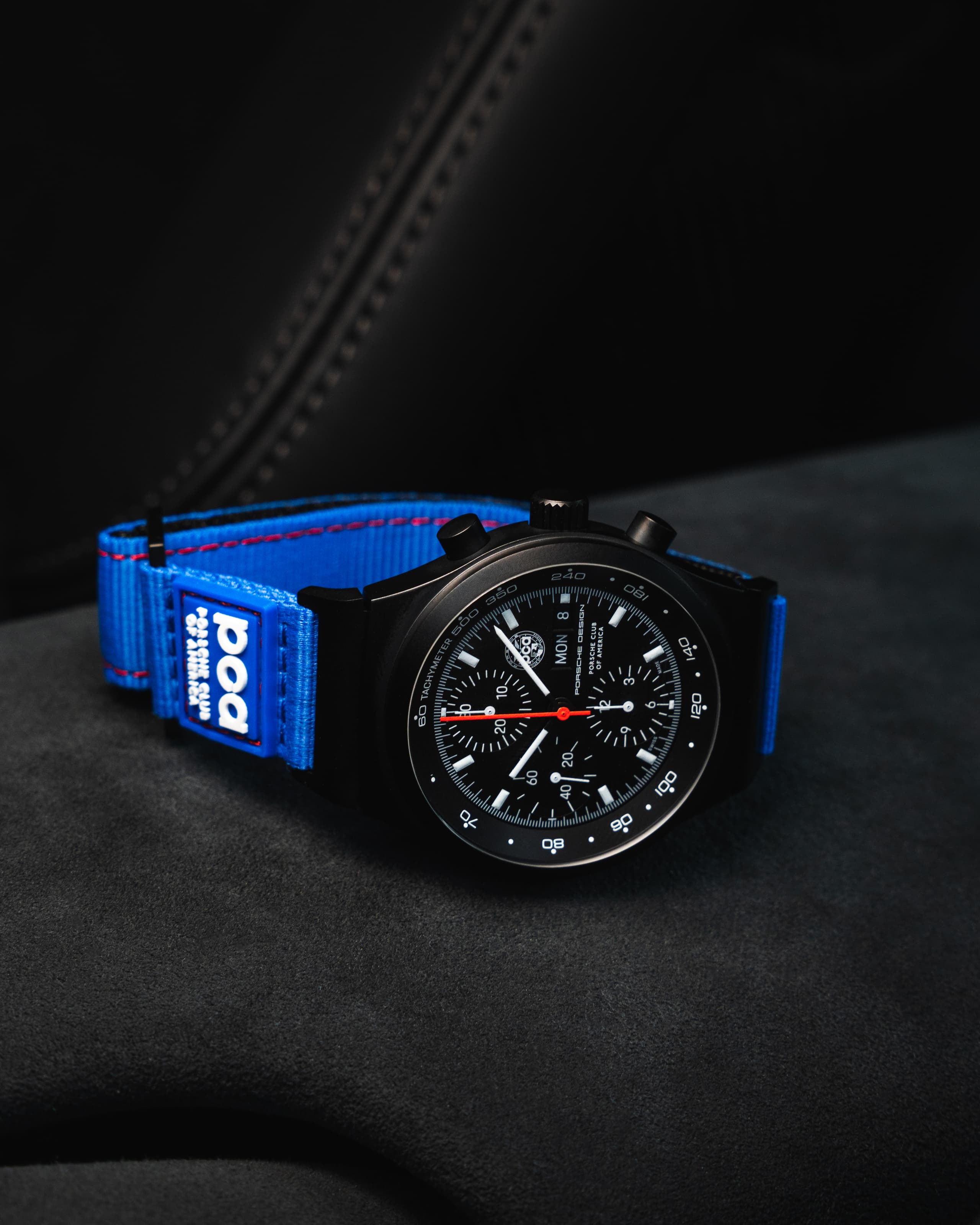 Chronograph 1 - PCA Member Edition with textile strap striped with PCA 70Y anniversary logo badge