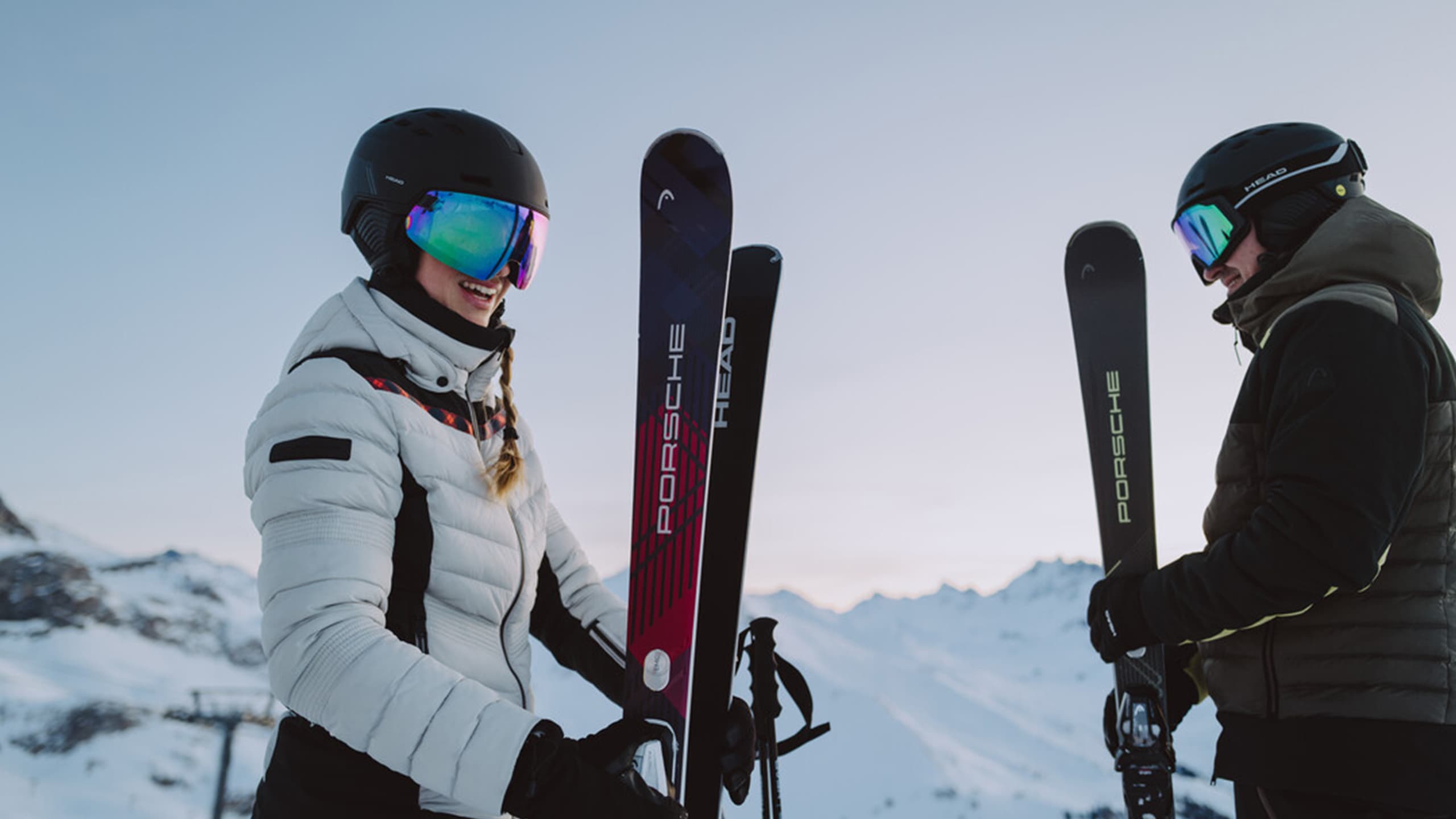 Two person with ski on a snowy mountain
