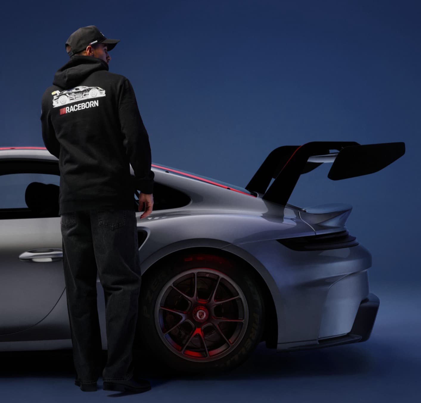 A sweatshirt celebrating Porsche Club Racing and 75 years of Porsche Motorsports with Raceborn spirit.