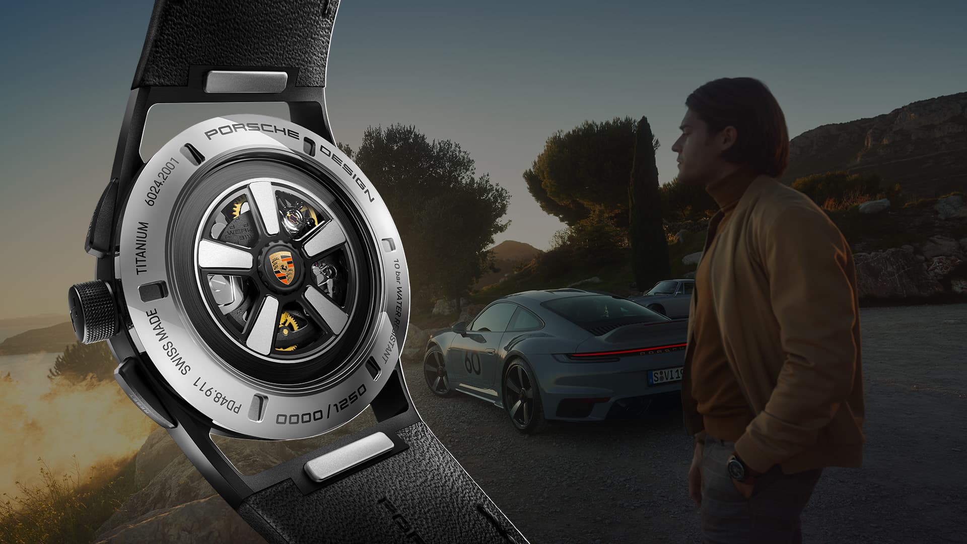 The Chronograph 911 Sport Classic from behind with a Porsche logo and a 911 and a man looking into the distance in the background