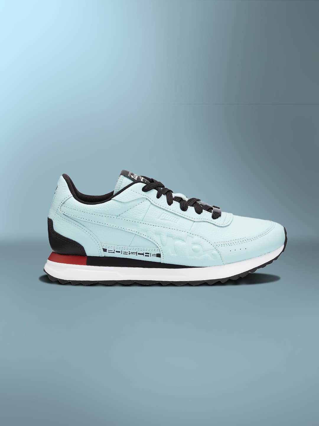 Polar blue colored sneaker on a light blue background.