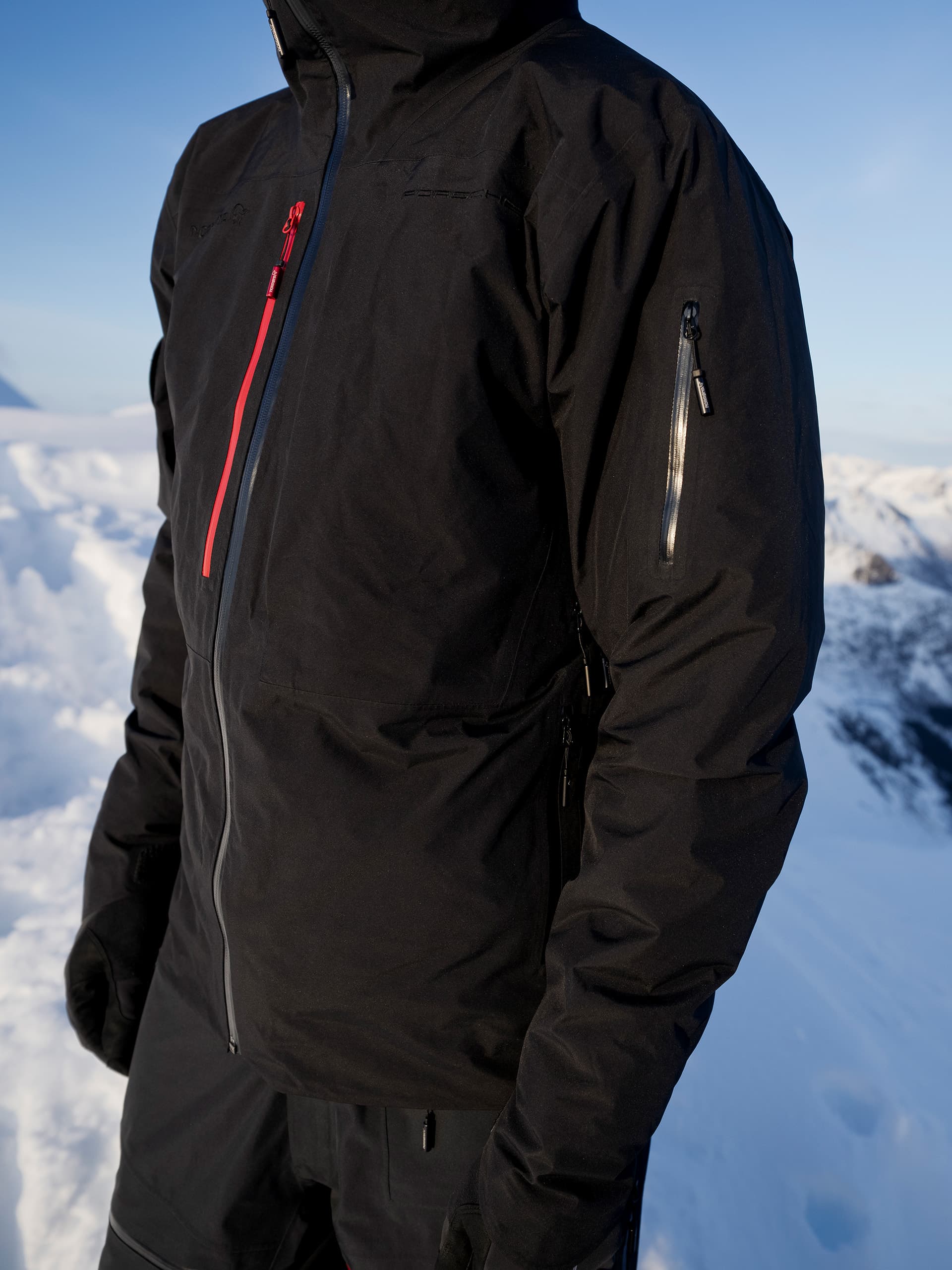 Detail Man wearing ski jacket from the Porsche x Norrøna ski collection