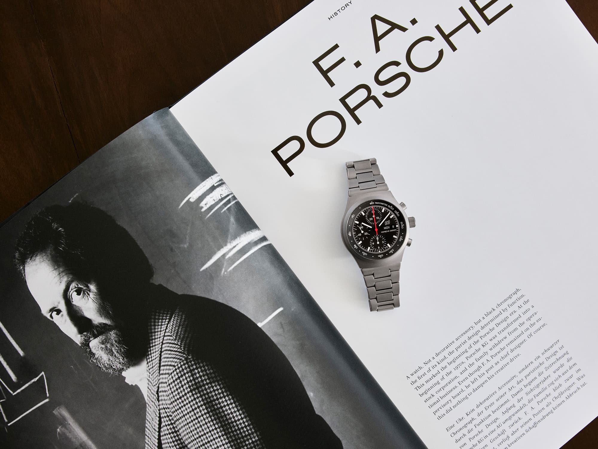 Chronograph 1 - 1975 Limited Edition on a open magazin showing an articla about professor F. A. Porsche