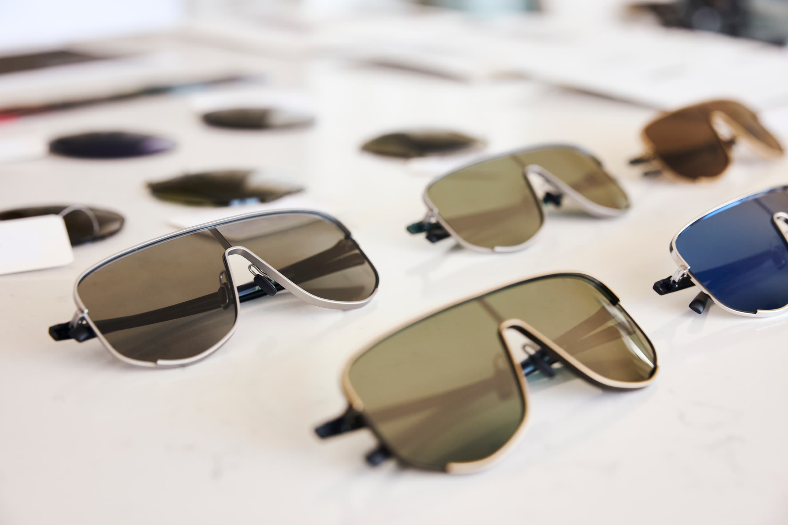 The picture shows the variety of the Porsche Targa #1 Eyewear series on a blank table.
