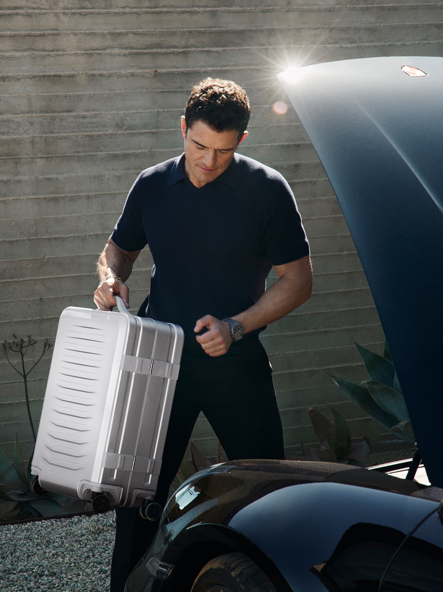 Roadster Aluminum Trolley Cabin Size, Porsche car and man carring other trolley in background