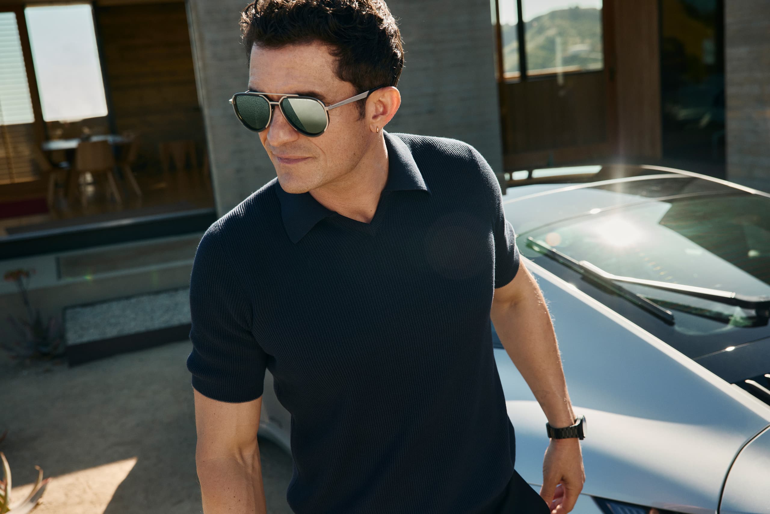 Orlando Bloom wearing the Porsche Design Hybrid Eyewear Series