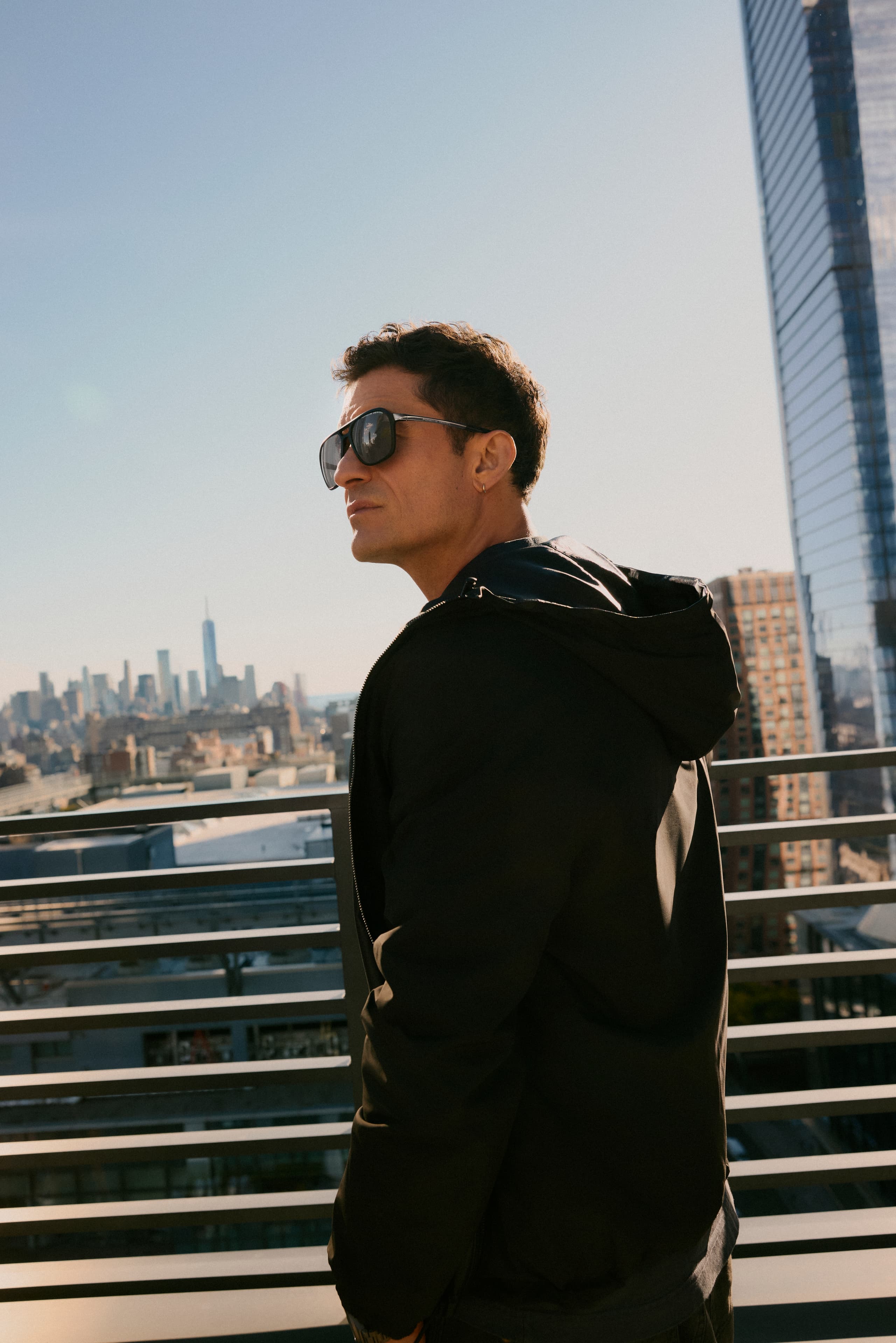 Orlando Bloom wearing the Porsche Design Flowing Titanium Eyewear Series