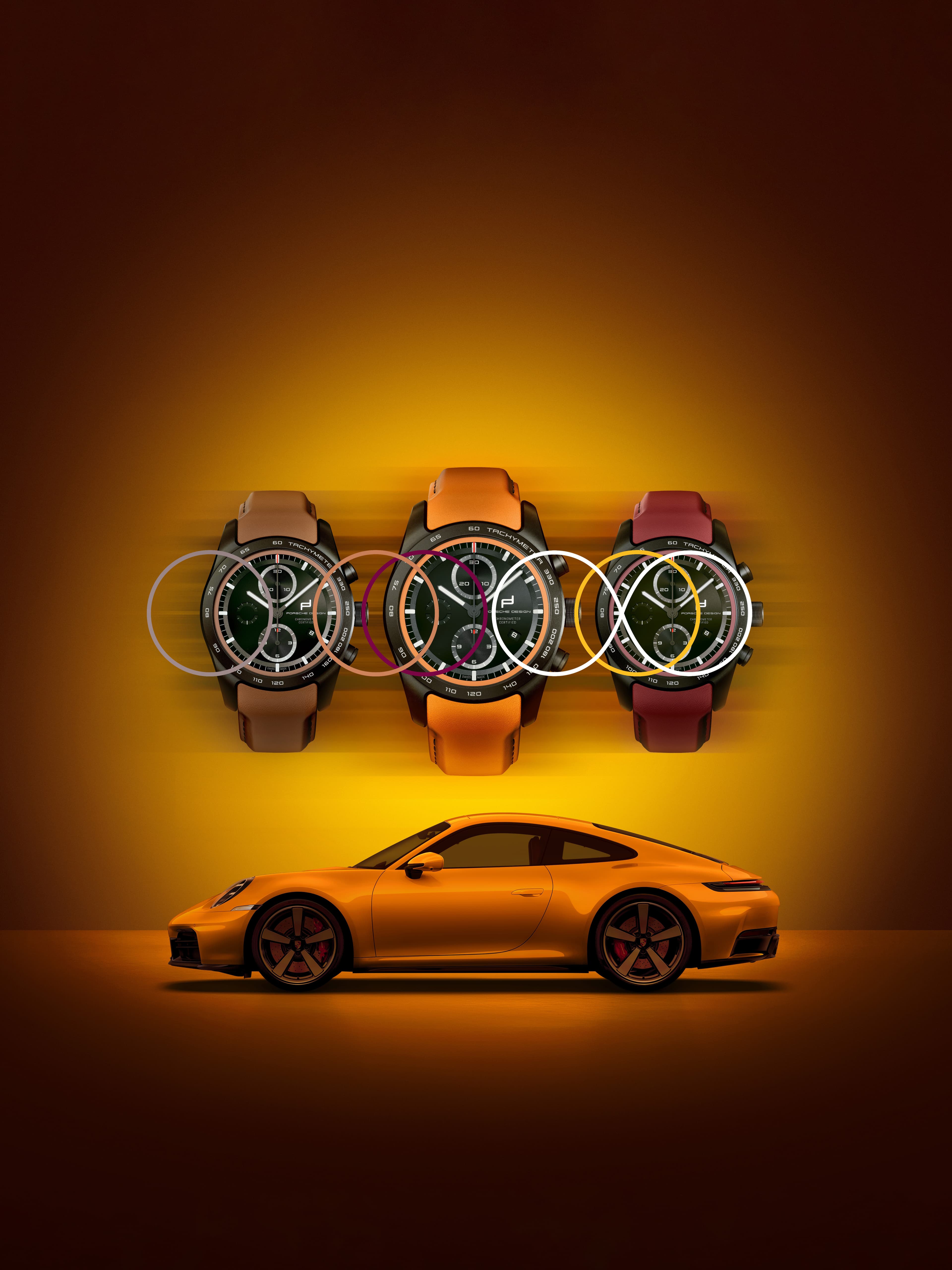 Three Porsche Design chronographs with colored straps displayed above an orange Porsche 911 on a yellow background.