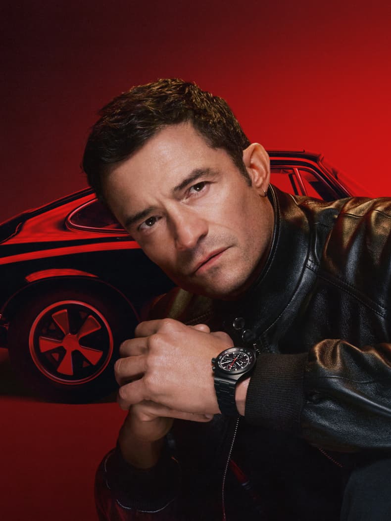 Orlando Bloom wearing black Porsche Design Timepieces Chronograph 1