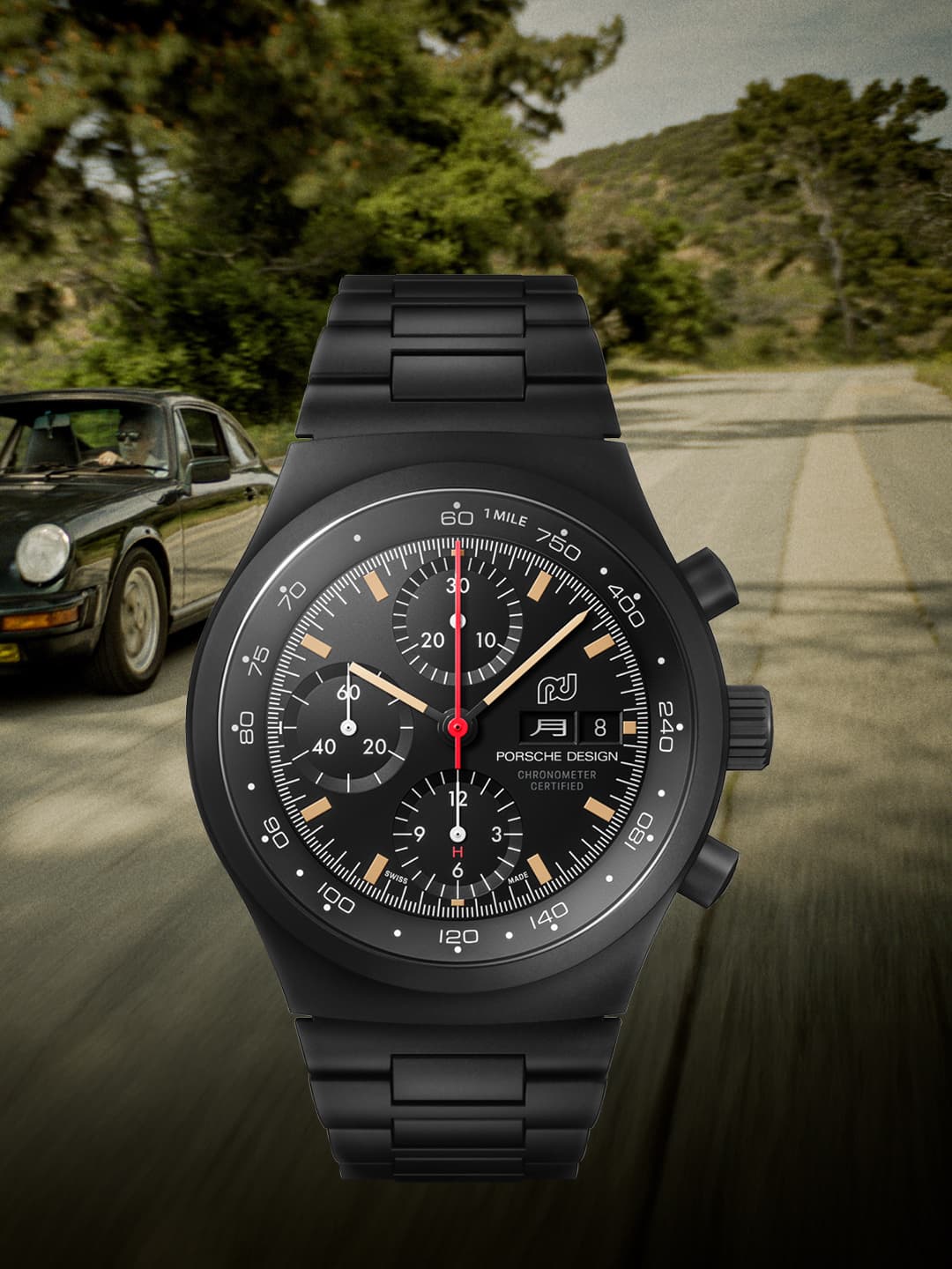 The picture shows a black wristwatch from Porsche, the Chronograph 1, with a porsche oldtimer in the background