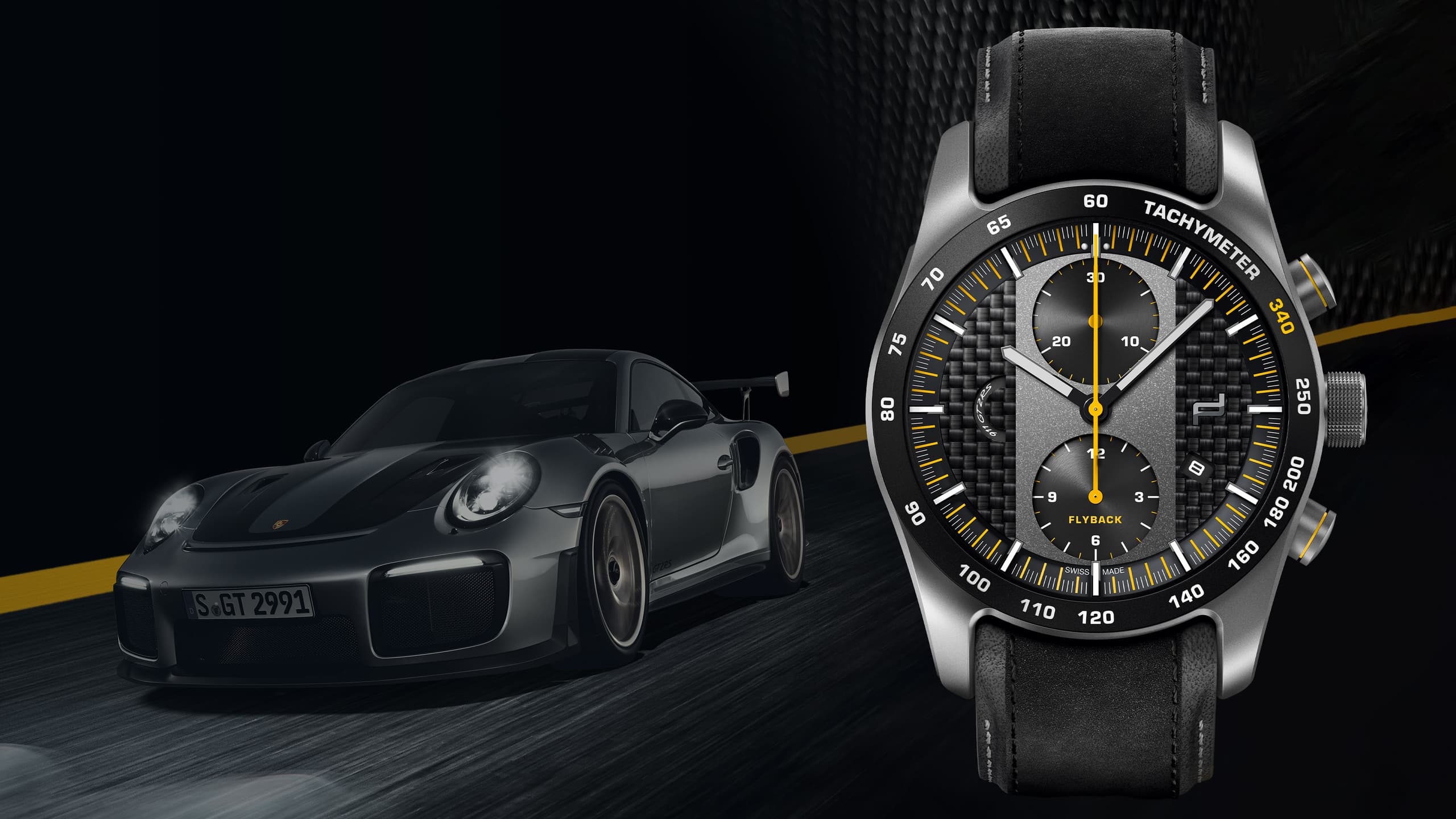 Na zdjęciu czarny zegarek na rękę Porsche Chronograph 1 GT2 RS; w tle samochód Porsche.