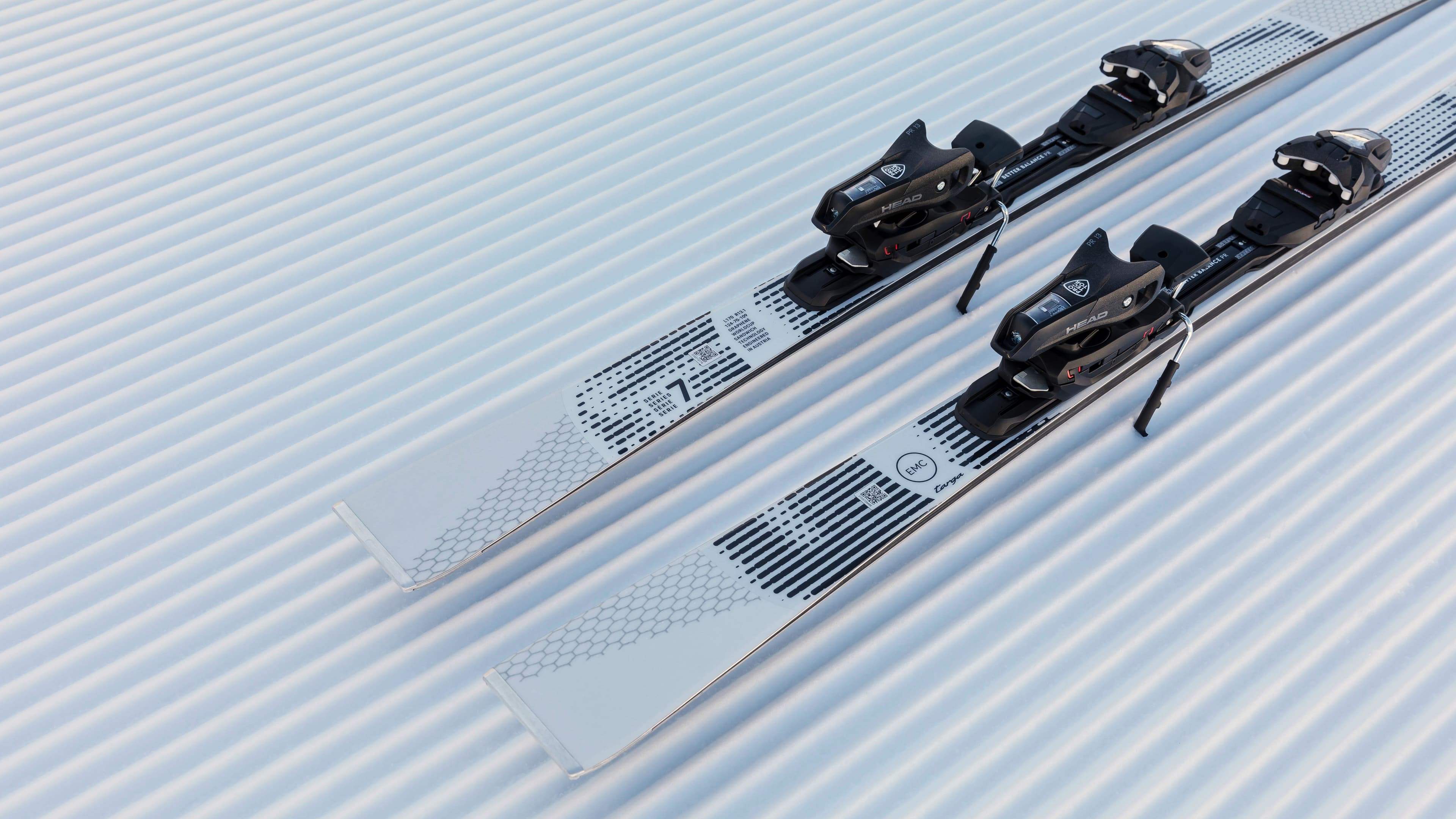 Porsche x Head Ski 7 Series Close-up of binding in focus on snow slope