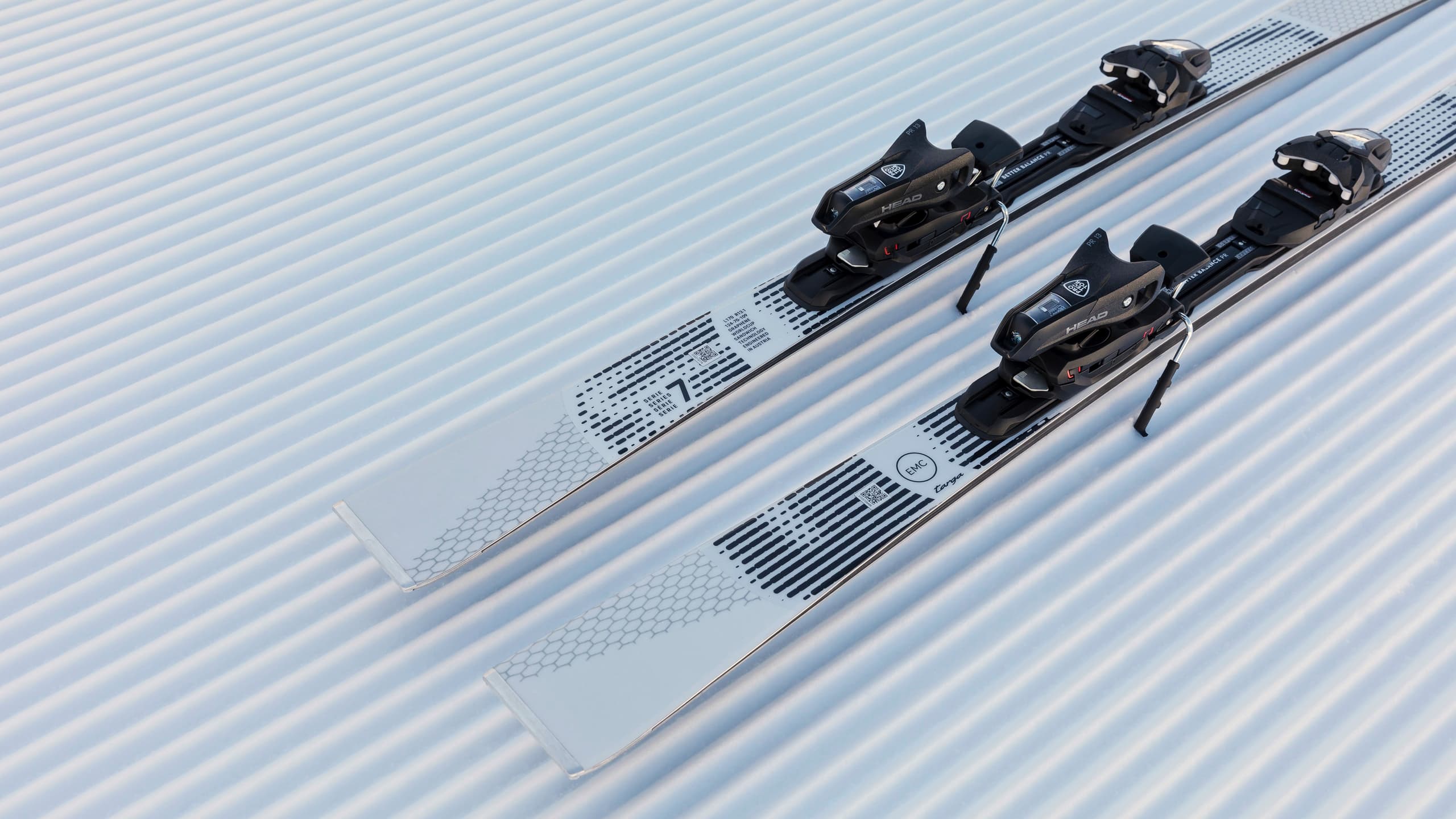Porsche x Head Ski 7 Series Close-up of binding in focus on snow slope