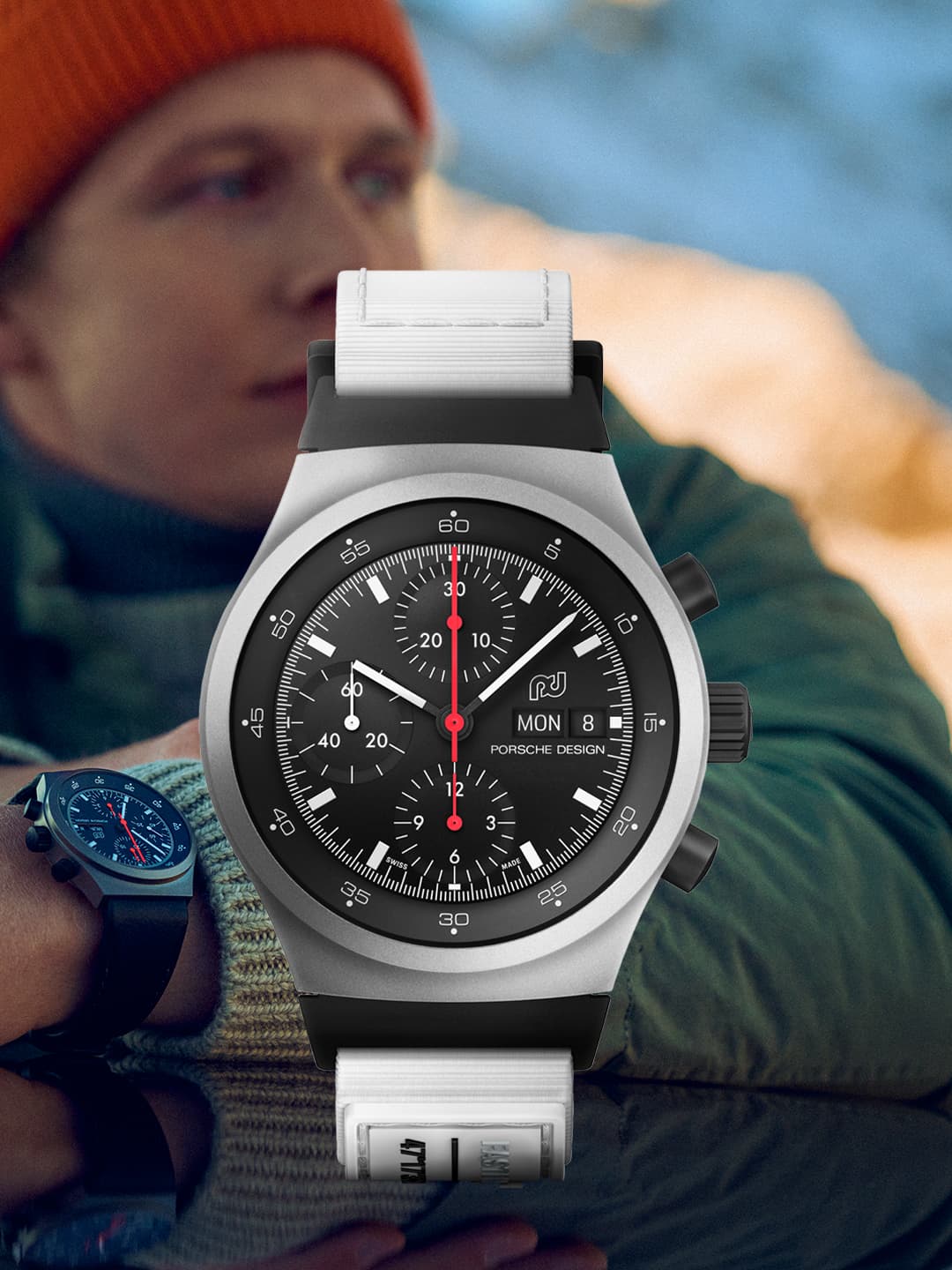 Pictured is the Chronograph 1-Ice Race 2023 Edition and a man can be seen in the background