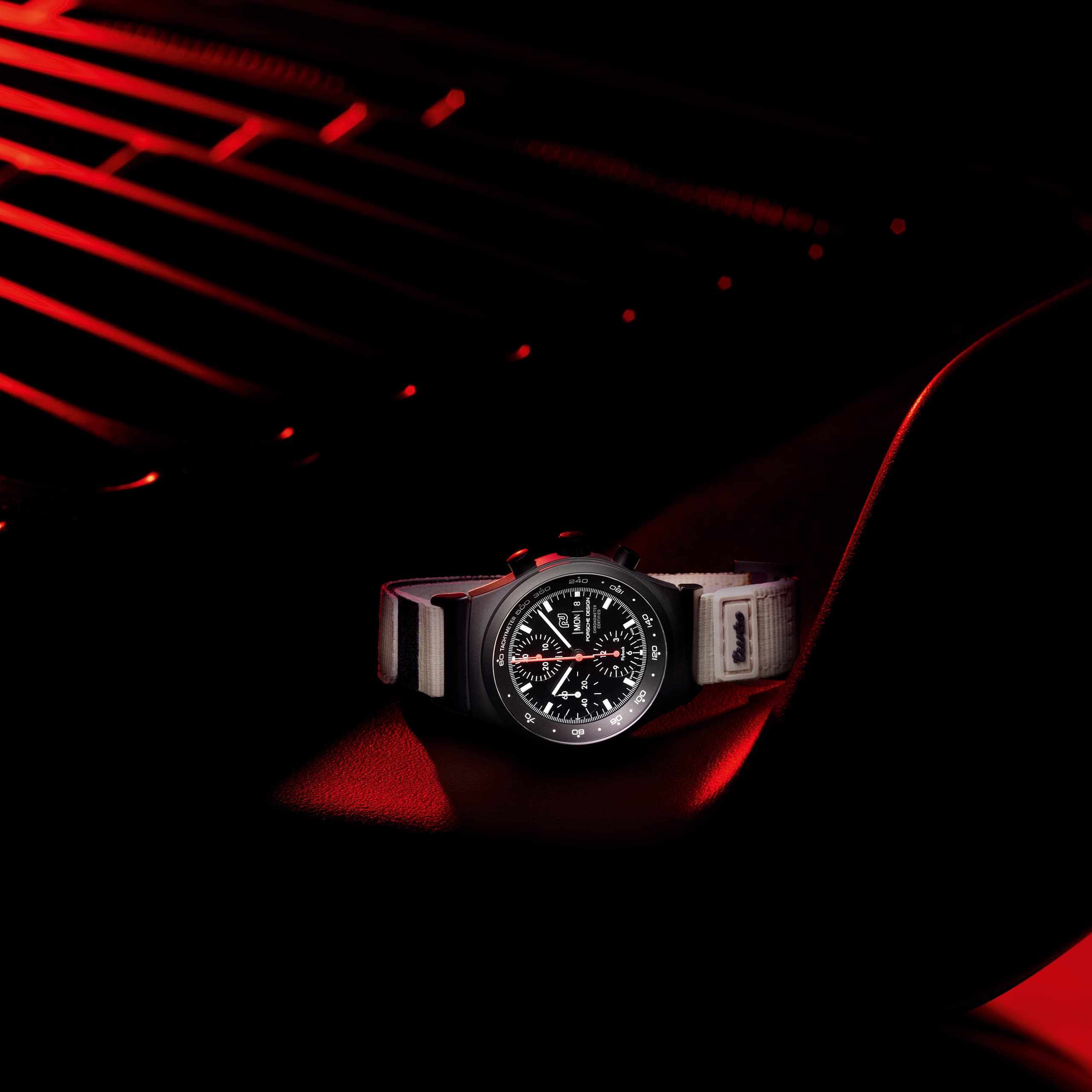 Chronograph 1 - 50 Years 911 Turbo Edition is positioned on the rear spoiler of a Porsche 911 Turbo