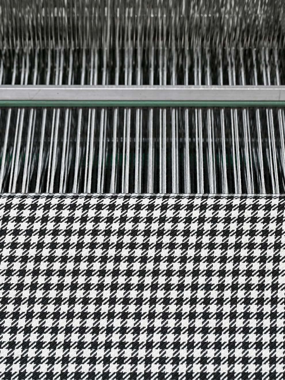 close up of a machine which produces the famous pepita pattern
