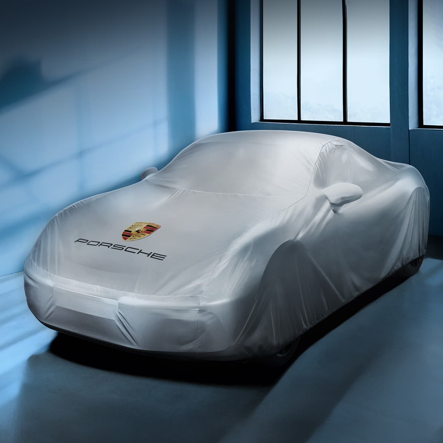 Yellow suitcase with telescopic handle on purple background, featuring Porsche Design logo and four wheels.