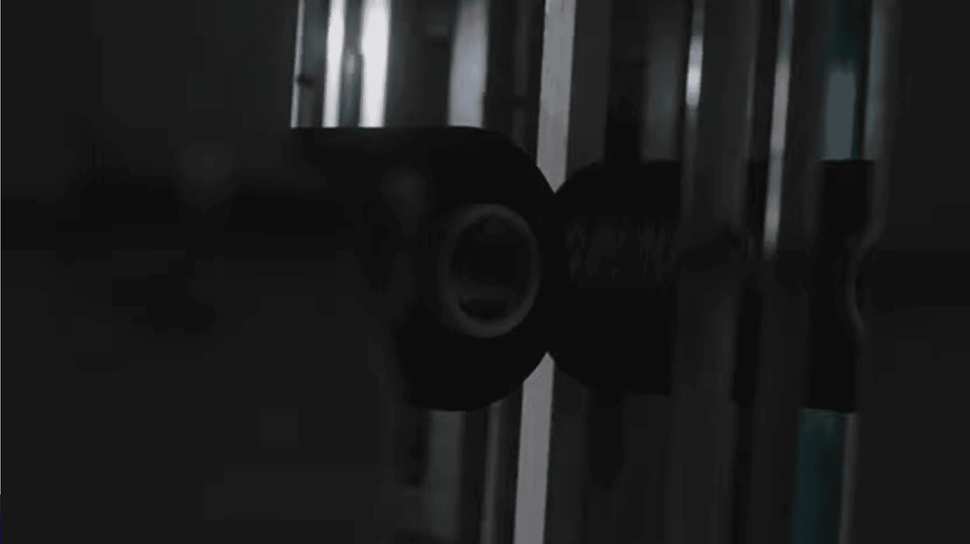 Close-up of a black yarn spool