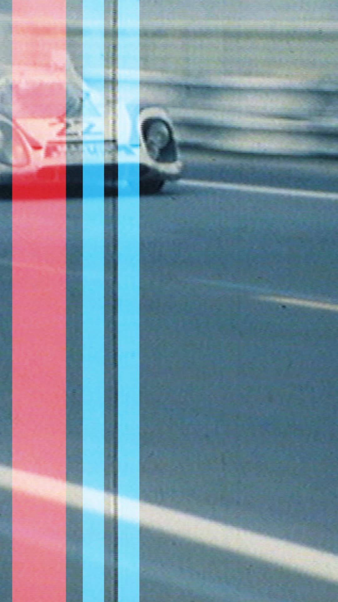 Hostoric driving scenes of a Porsche MARTINI RACING car