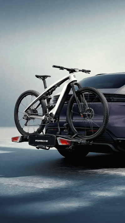 Video is AI generated and shows a purple Porsche Macan with different tequipment products from Porsche